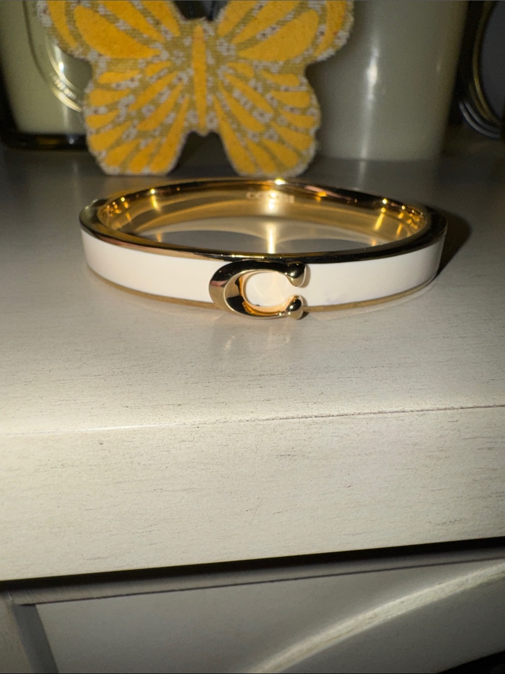 Coach White Enamel Bangle with Gold C Emblem